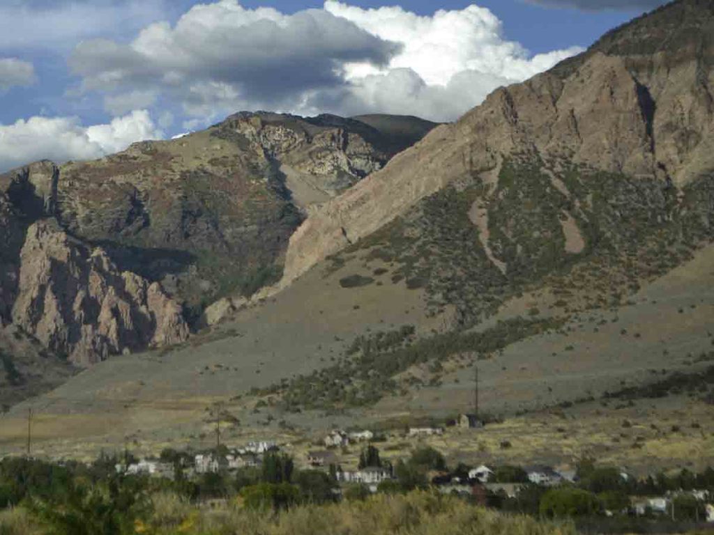 The Wasatch Mountains provide stark contrast to the houses below.