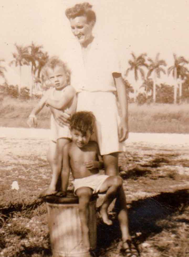 Jon never cared much for recognition.  He shows Thelma his disapproval for the camera while Mason appears blasé about the whole thing.  Palm trees tell us this scene was shot somewhere in Miami.