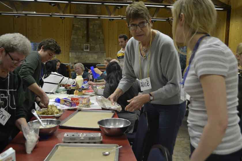 Alice was busy making appetizers while other people with aphasia filled other bowls with delight.